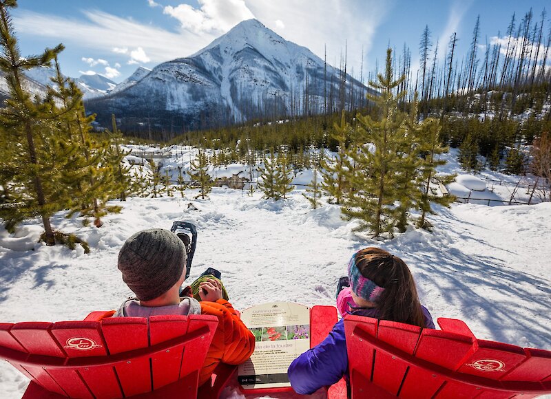 A couple enjoying the mountain views at Marble Canyon in winter