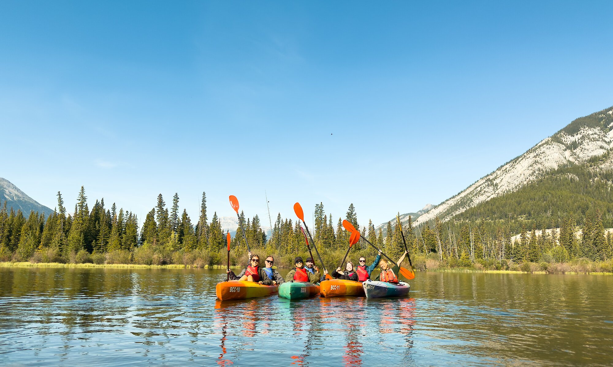 A group of paddlers on the Kayak Experience on Vermillion Lakes