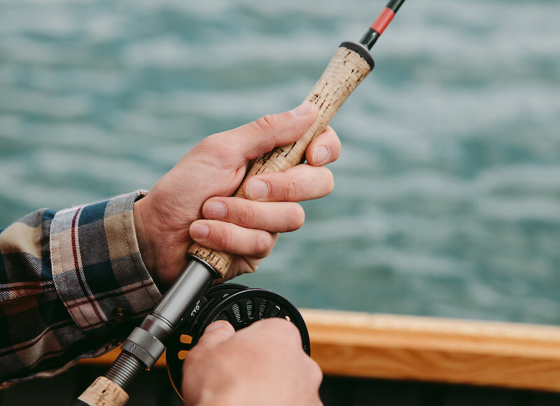 Fishing rod and reel on Lake Minnewanka