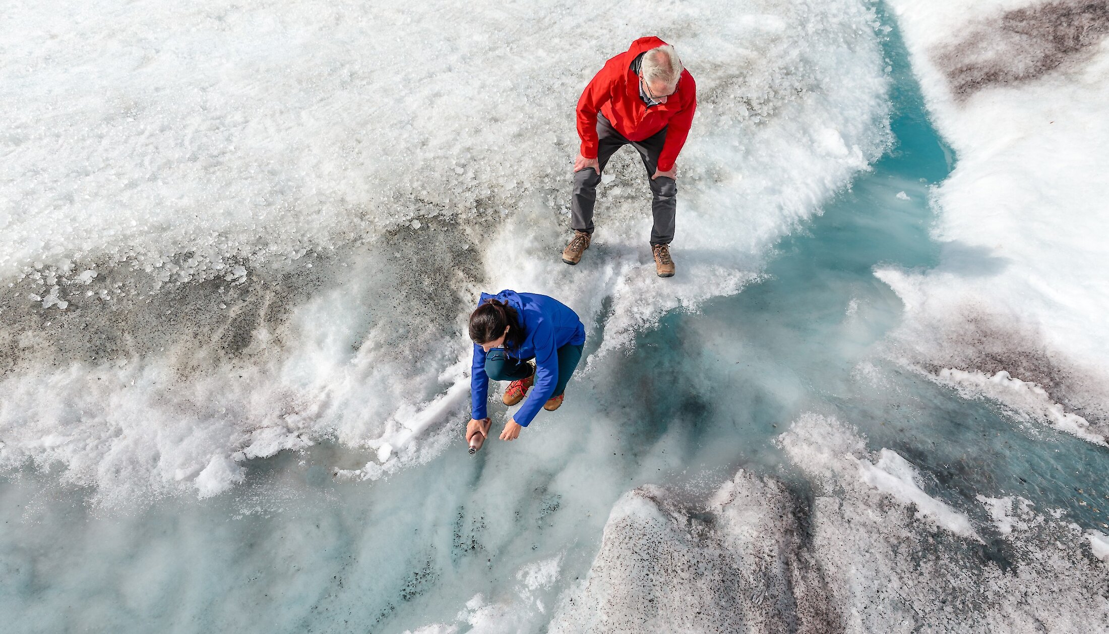 Getting fresh water right from the glacier at the Columbia Icefield