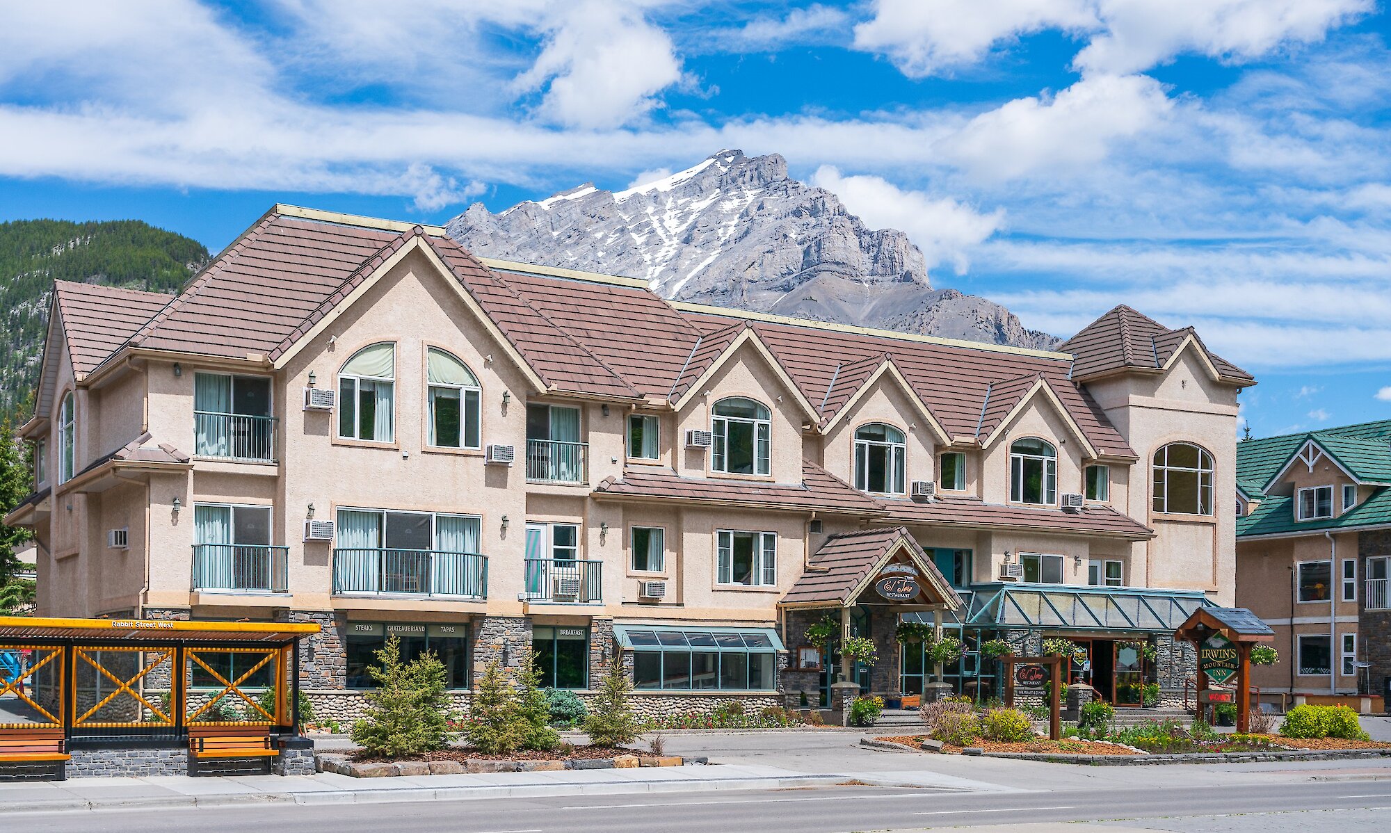 Exterior of Irwins Mountain Inn in summer