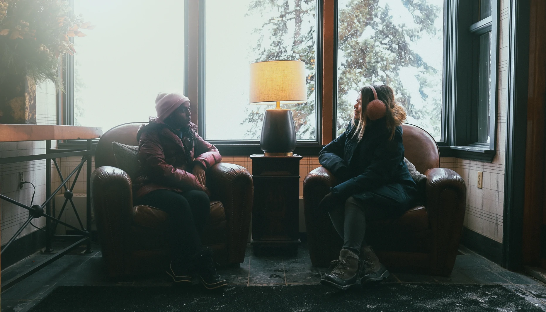 Guests sitting inside Emerald Lake Louise chatting
