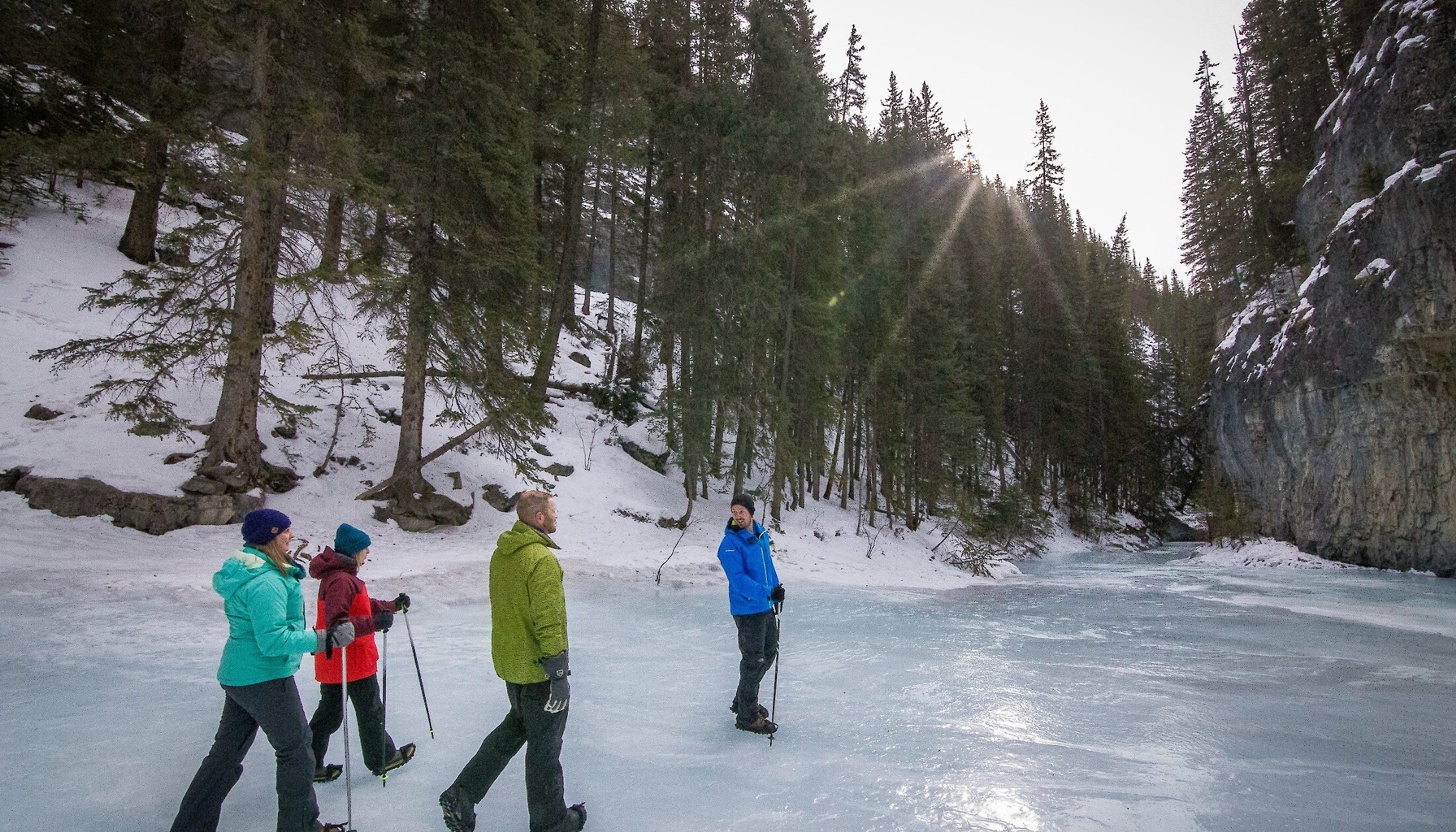 Walking on a frozen river in Grotto Canyon