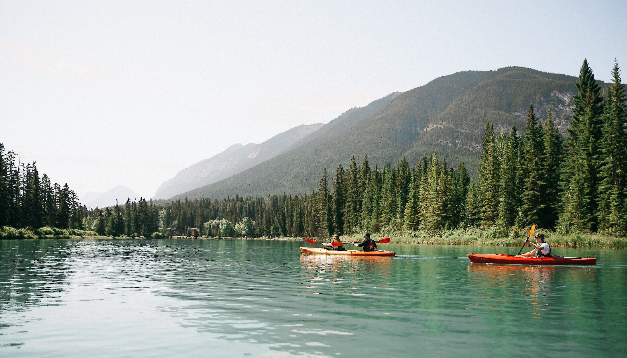 Kayaks heading back to Banff Canoe Club