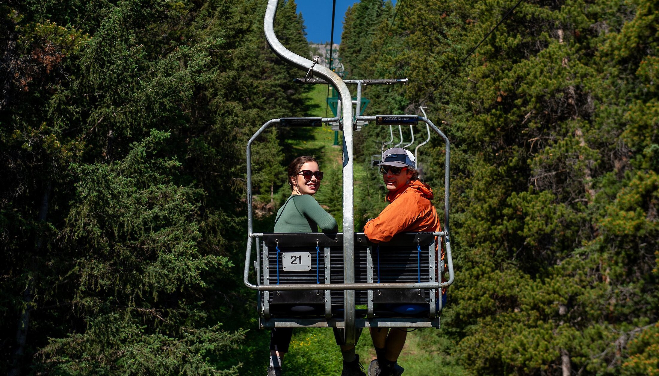 Enjoying the views on the way up Mount Norquay chairlift