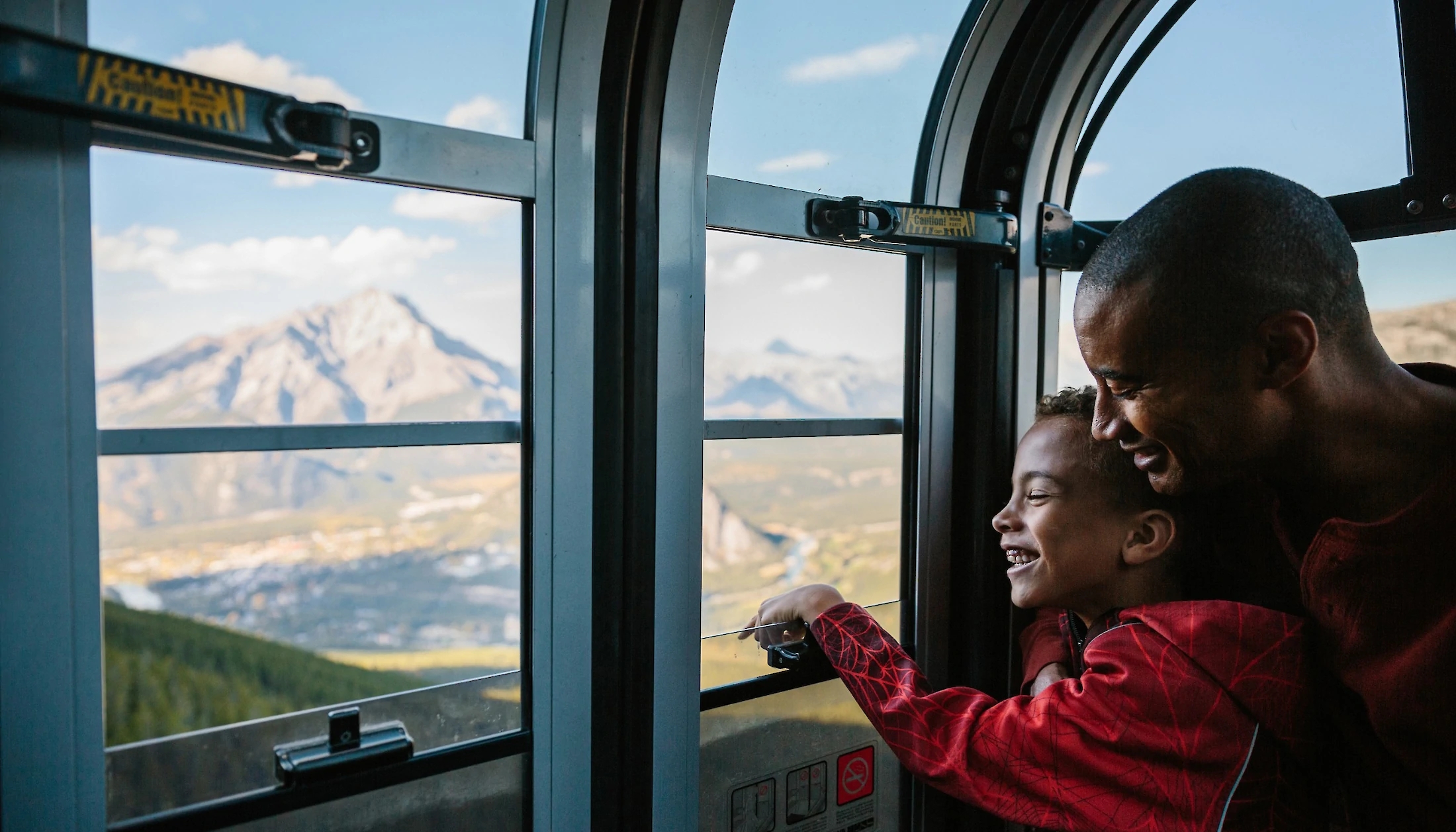 Inside the Banff Gondola cabin riding to the top of Sulphur Mountain