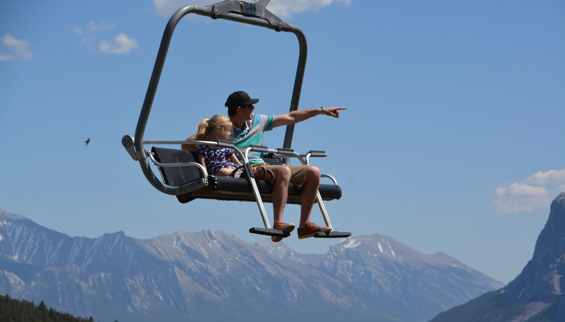 Pointing out the sights from the Mount Norquay chairlift