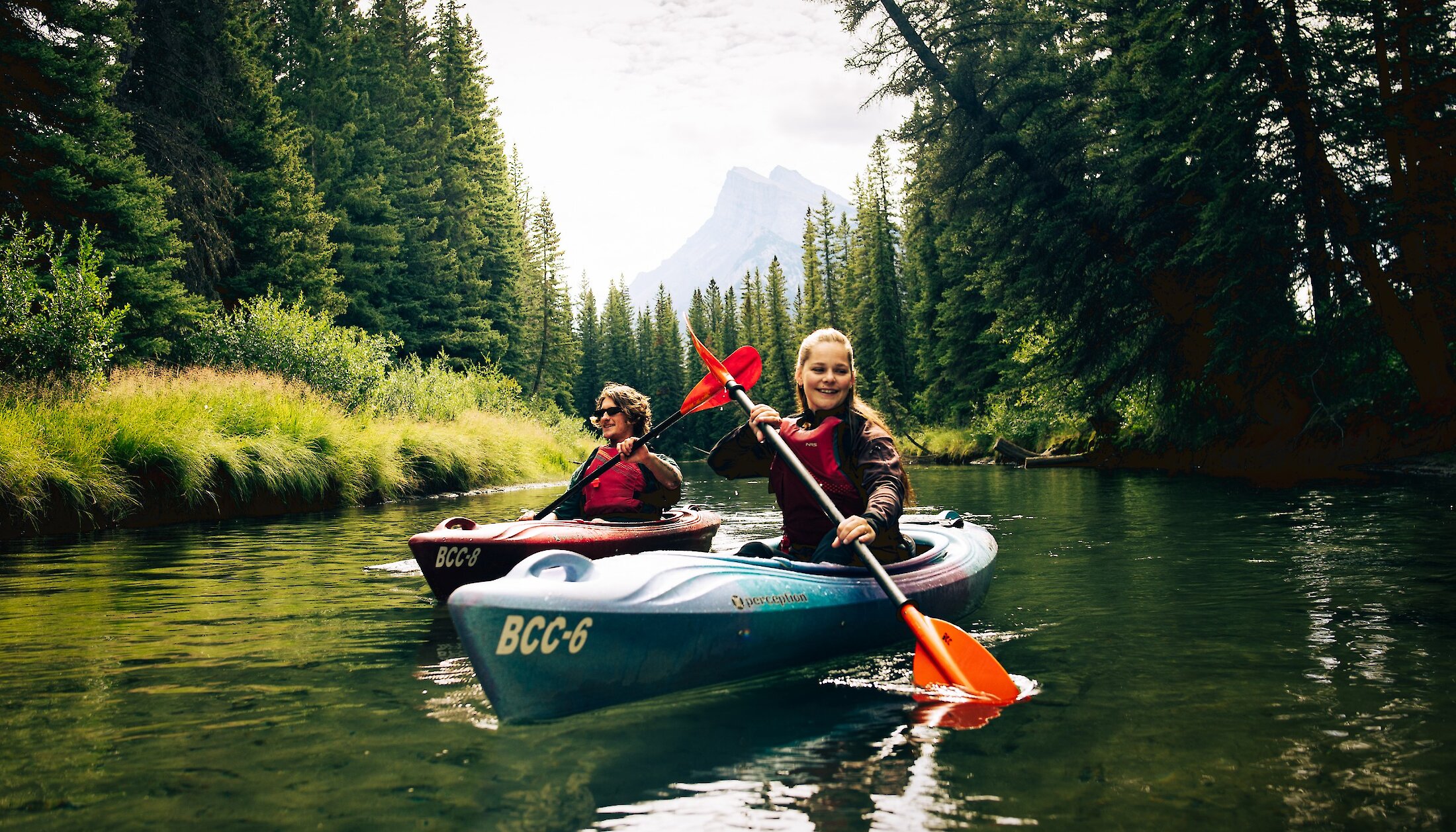 Kayakers heading up the beautiful Bow River