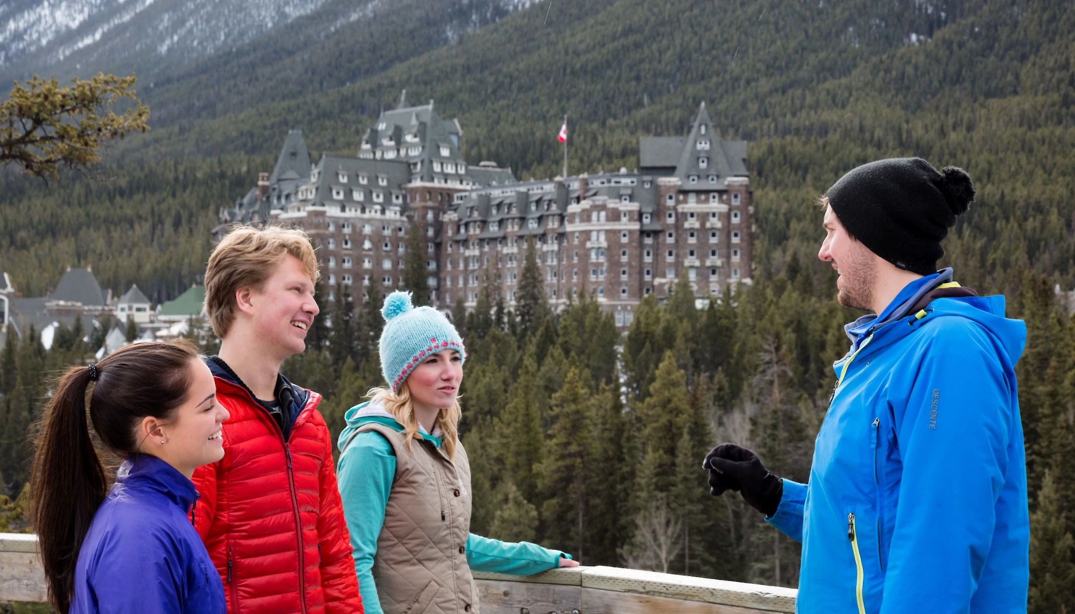 A lady enjoying the view of Mount Rundle on Banff sightseeing tour