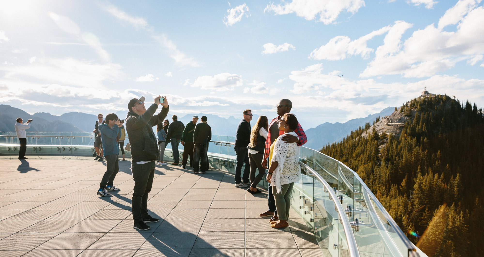 Taking a photo on the viewing deck of the Banff Gondola