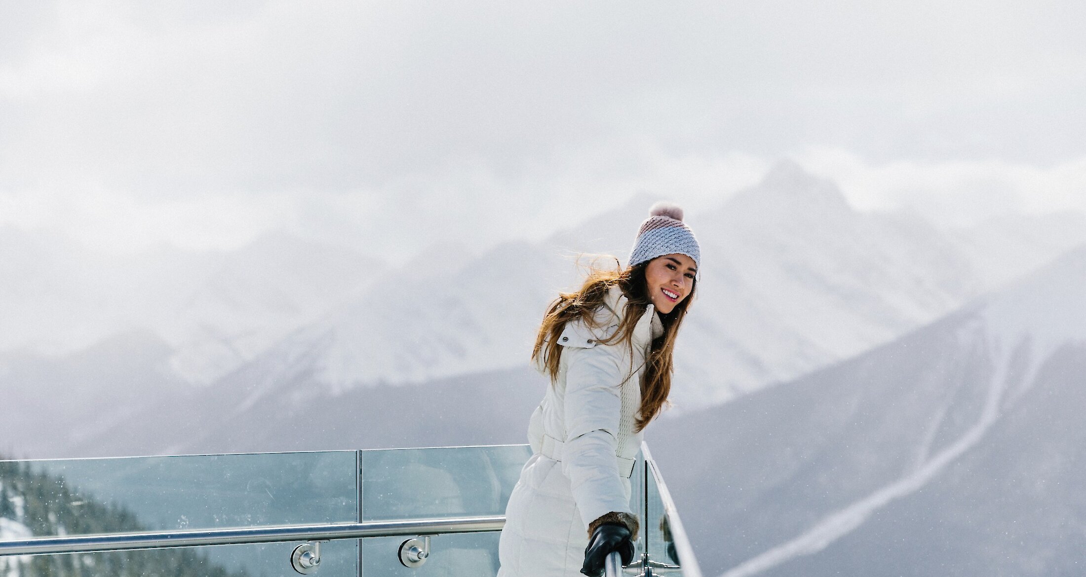 A lady at the Banff Gondola admiring the Canadian Rockies