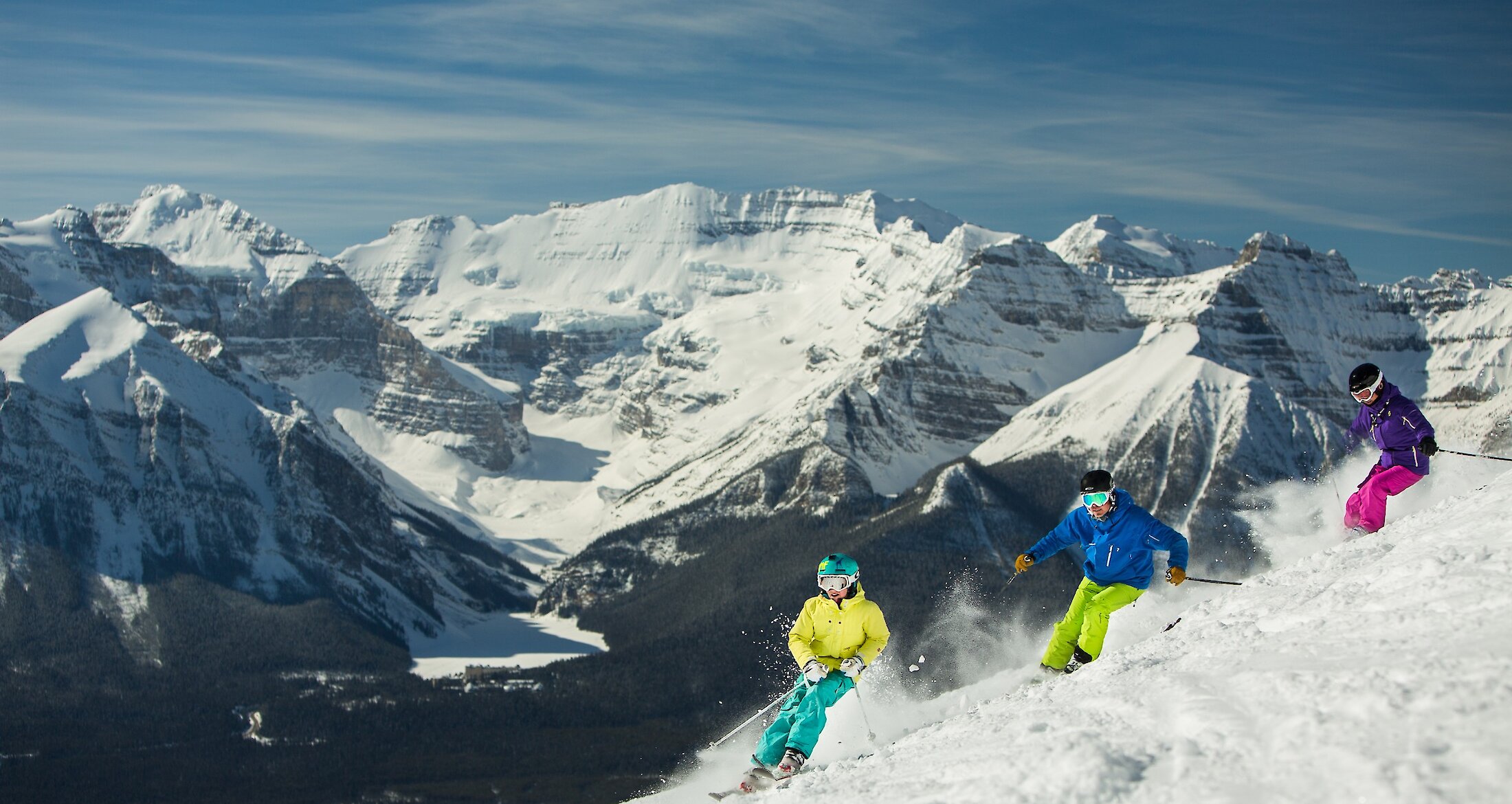 A group of friends skiing at Lake Louise