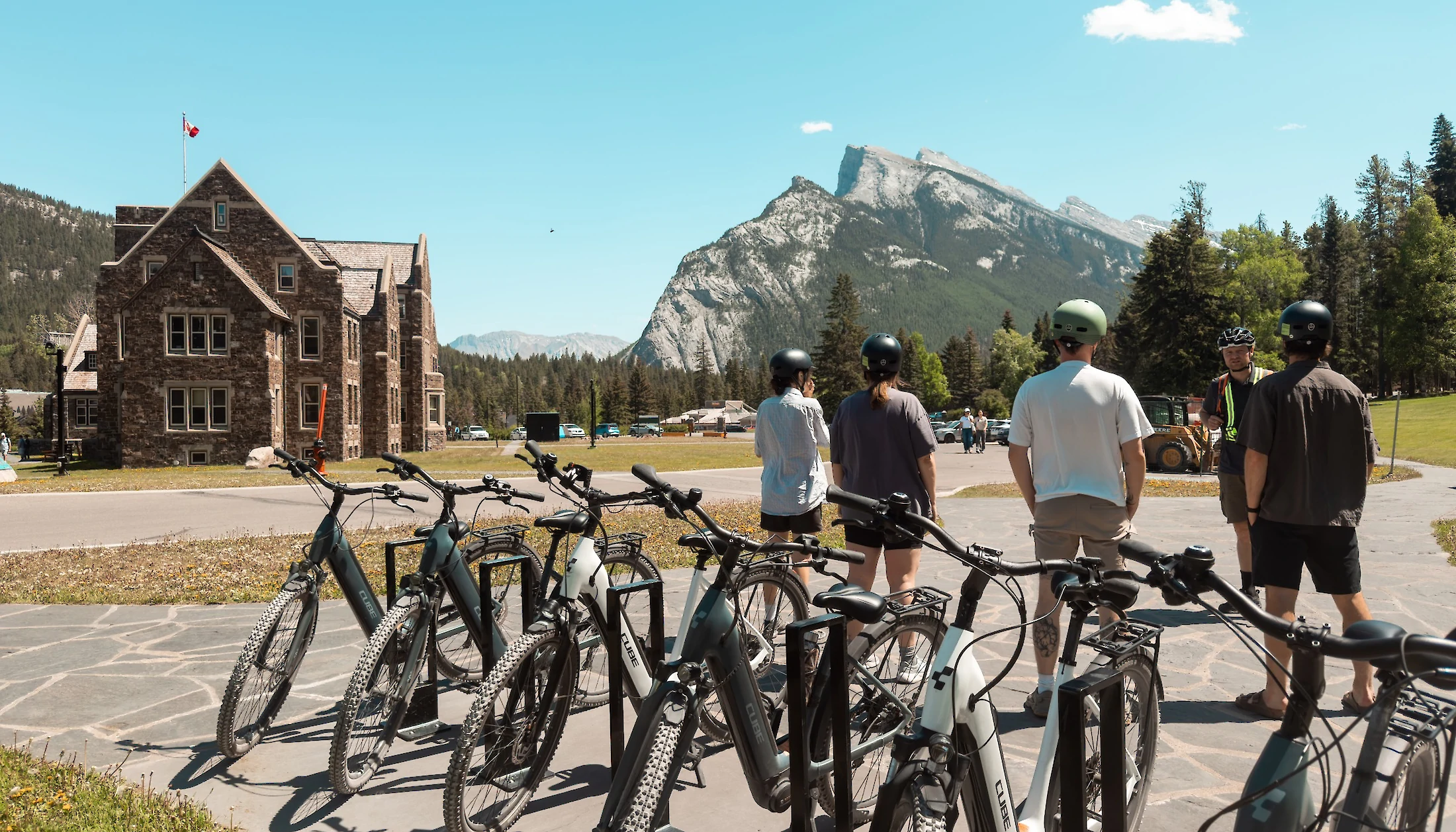 A group of e-bikers on a guided tour at Cascade Gardens