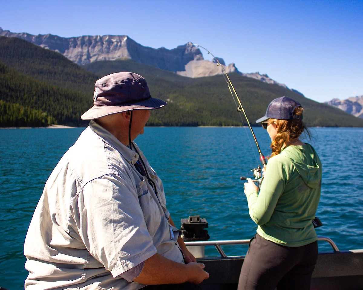 A guide and guest fishing on Lake Minnewanka
