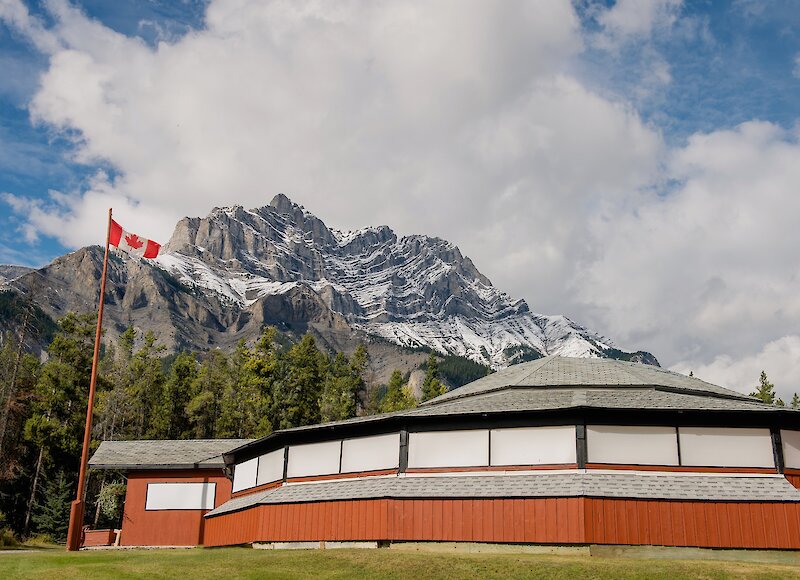 A view of the Banff Park Ranch Roundhouse with Cascade Mountain
