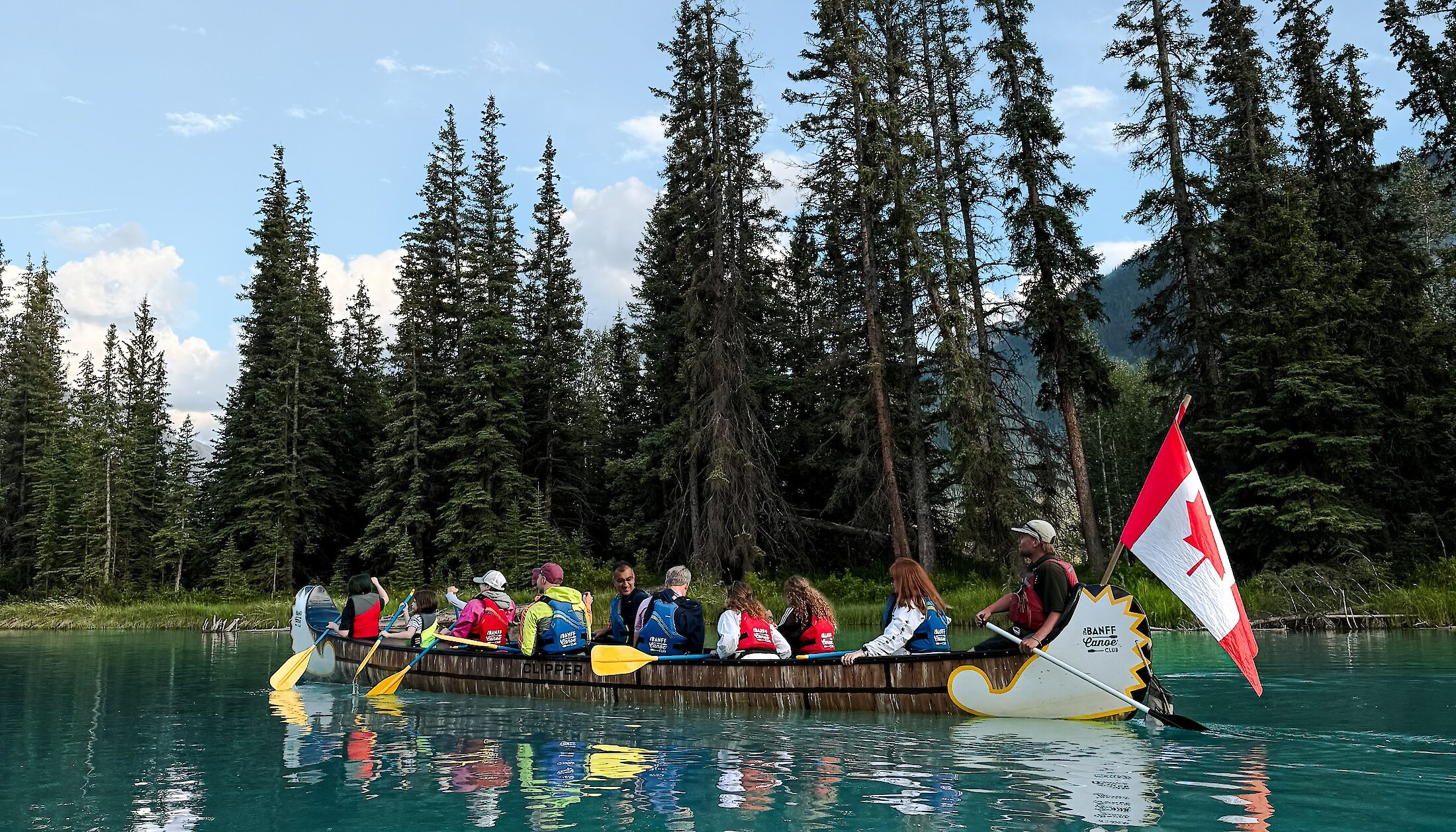 A view of the voyager canoe floating back to the dock