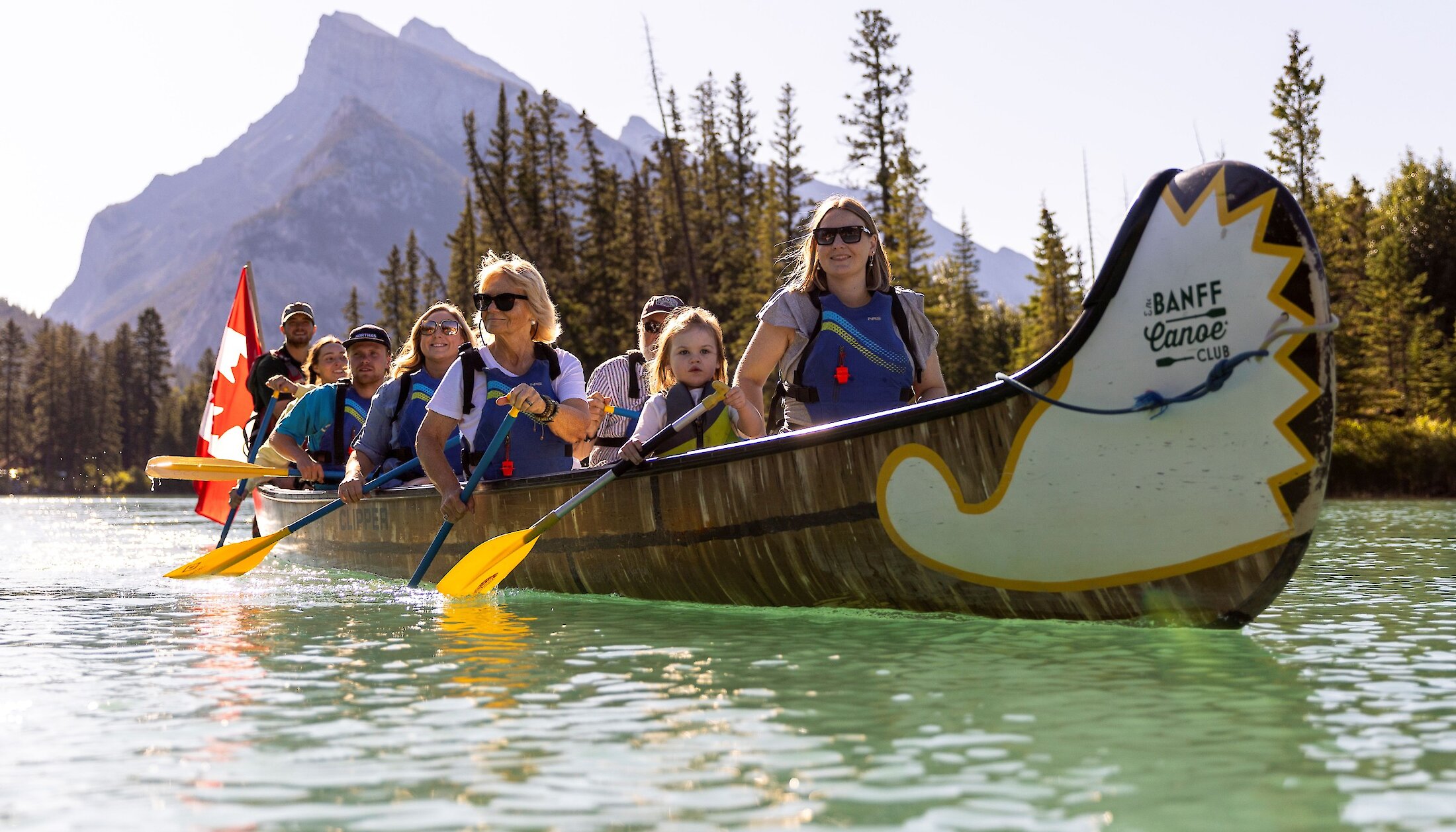 A view of the voyager canoe floating back to the dock