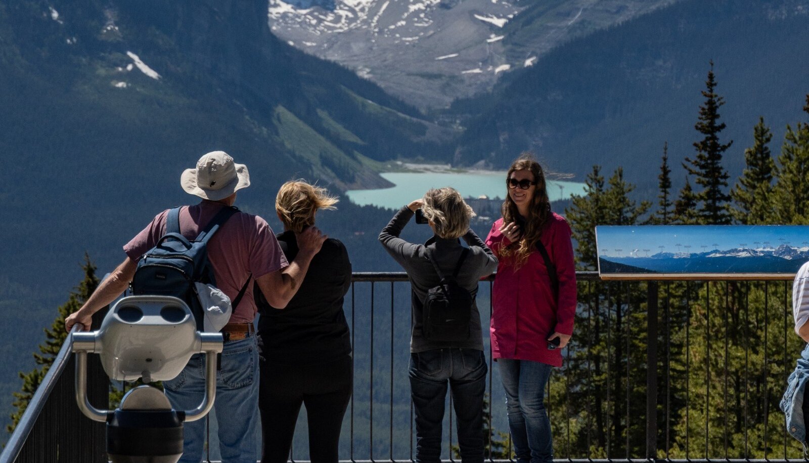 A group of friends taking a picture at the Lake Louise Summer Gondola