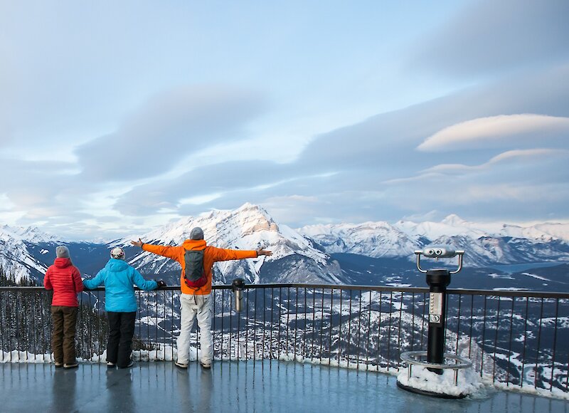 A group of friends admiring the view of Banff from the Banff Gondola