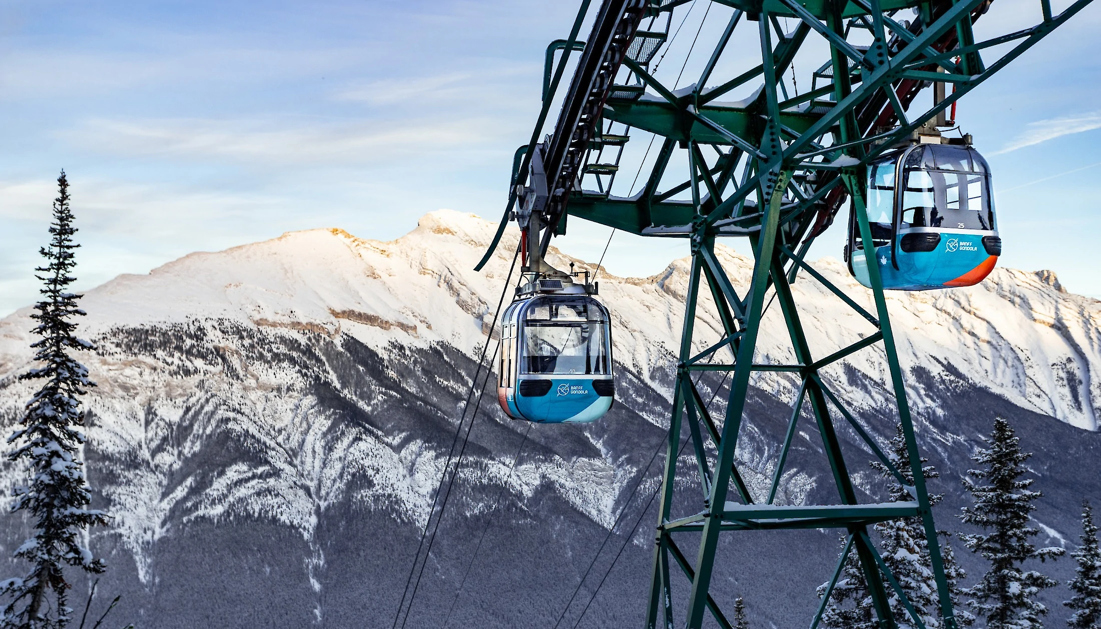 A view of the Banff Gondola cars with Mount Rundle in the background