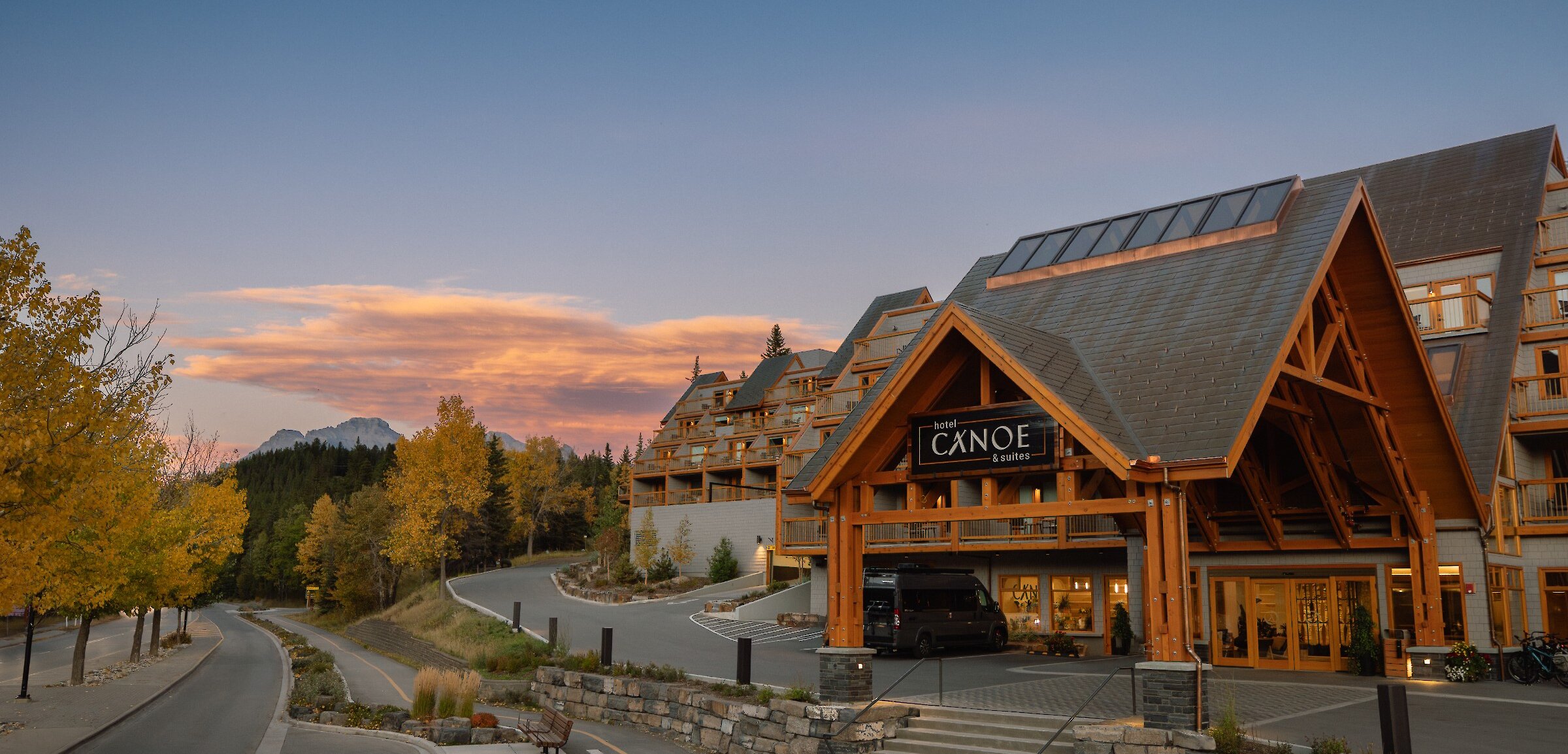 A view of the Canoe Hotel & Suites from Banff Ave