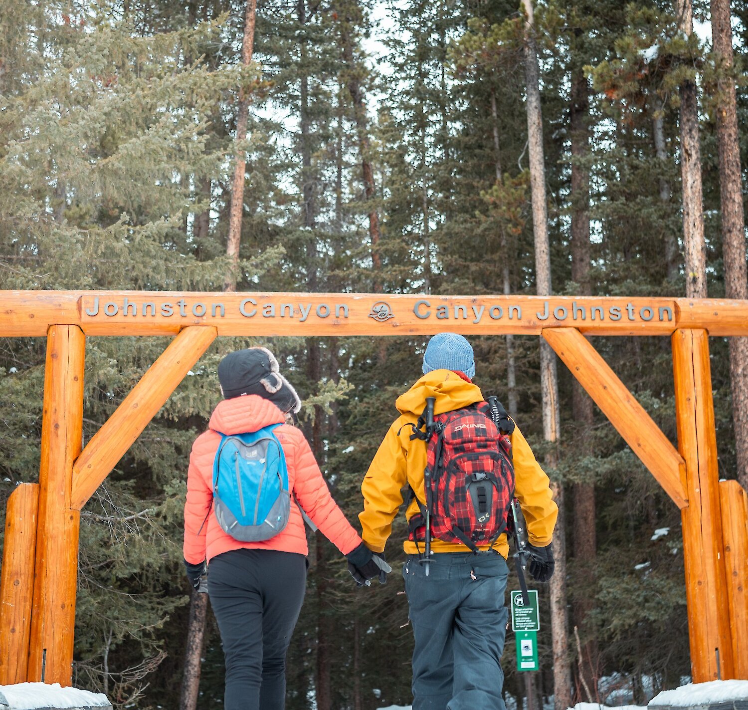 A couple walking towards Johnston Canton trailhead.