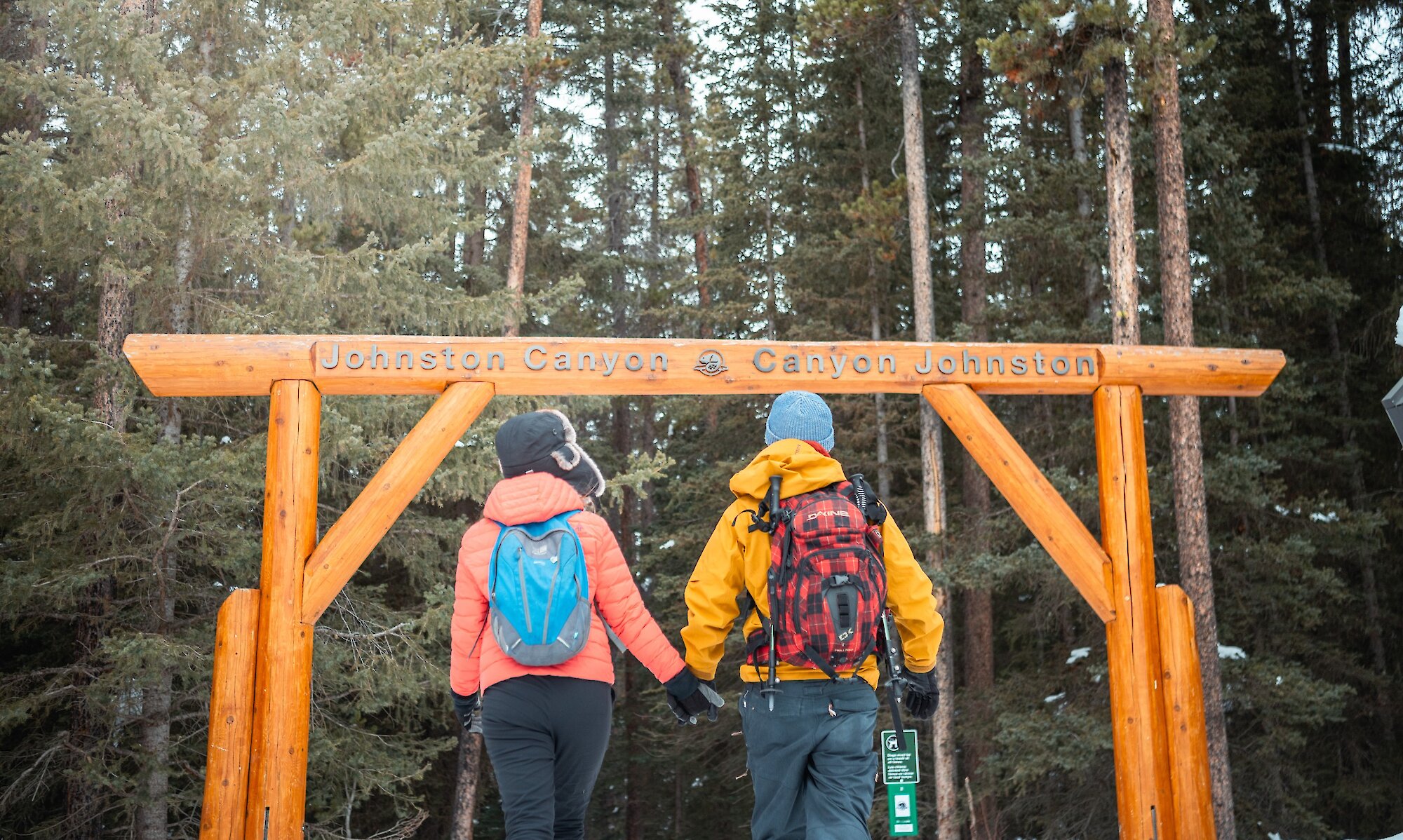 A couple walking towards Johnston Canton trailhead.