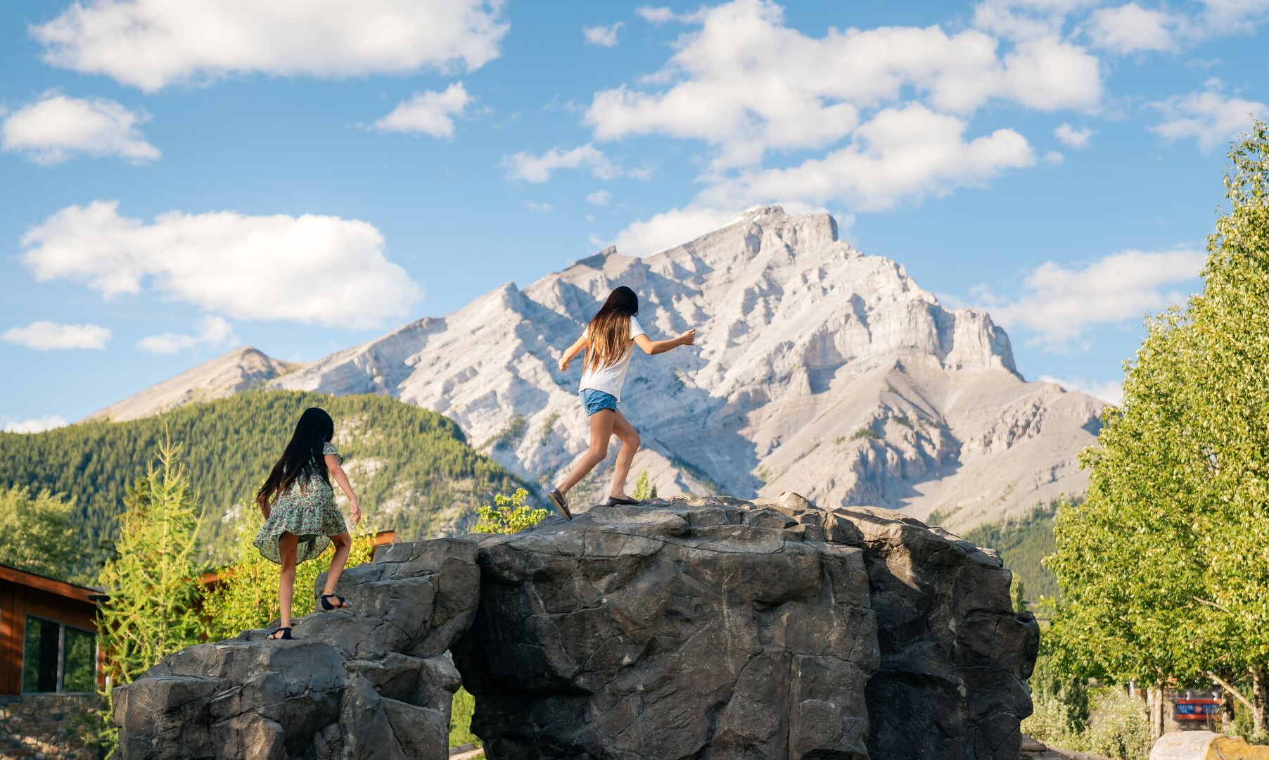 Kid playing in Central Park in Banff