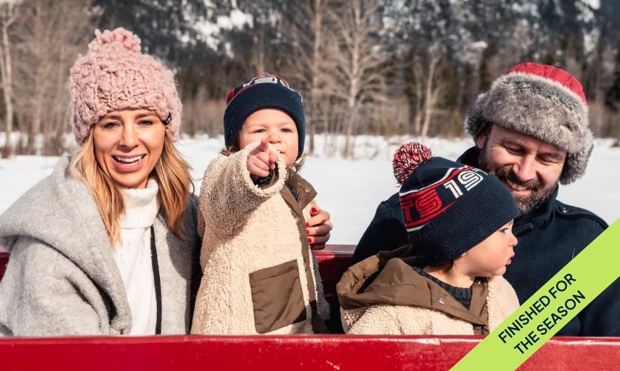 Family enjoying a Sleigh ride in Banff