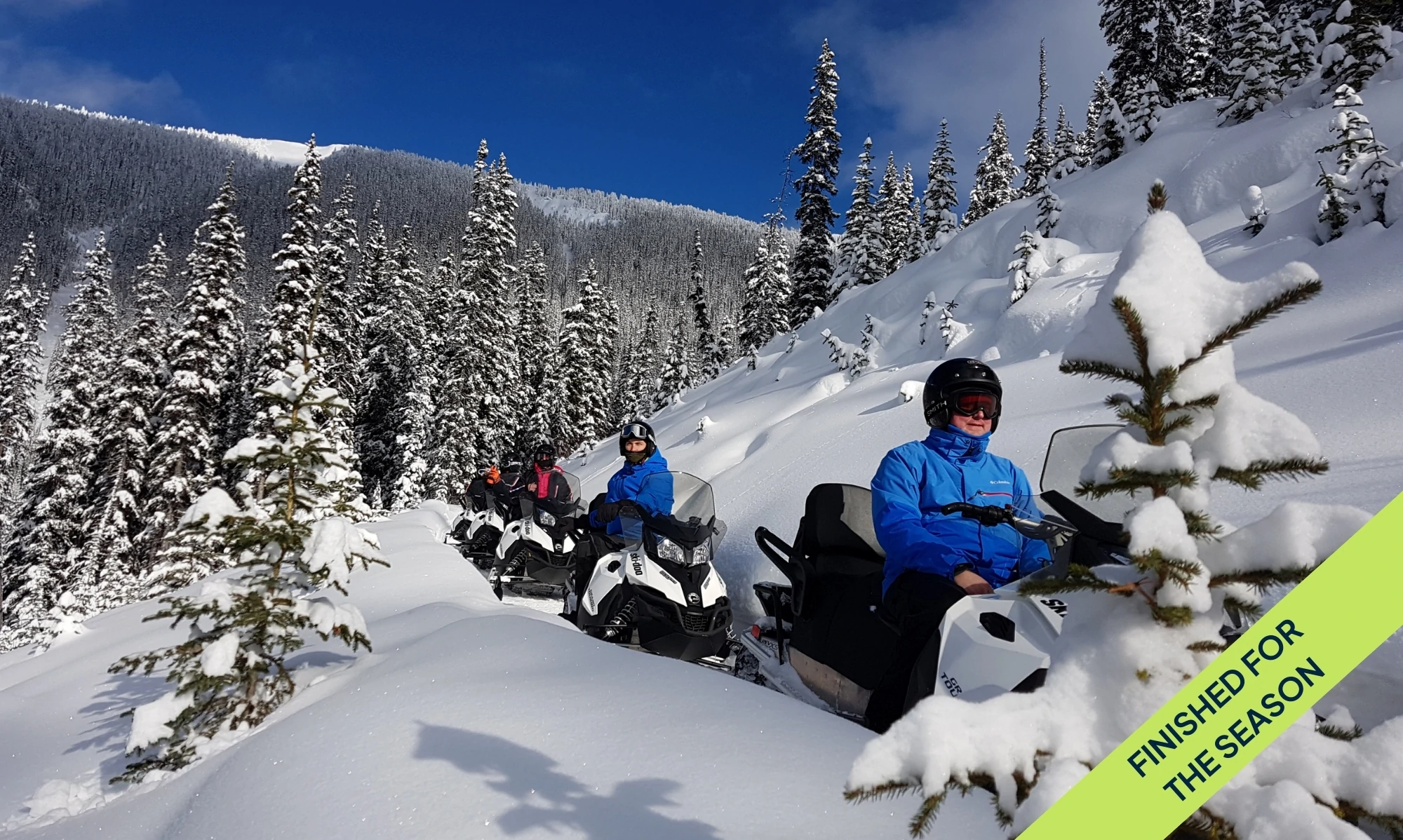 A group of snowmobilers on the trail in Golden