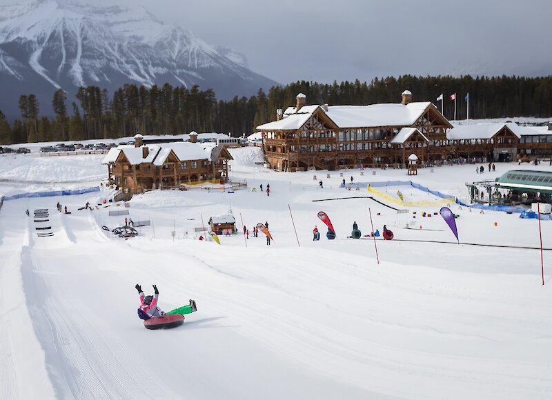 Having fun snow tubing at Lake Louise