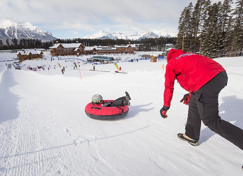 Sliding down the snow tube lanes at Lake Louise