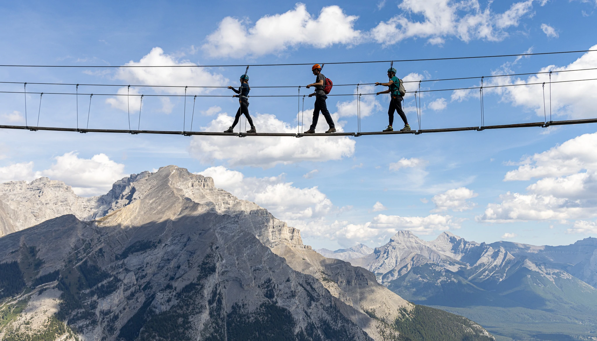Walking on the Suspension Bridge on the Via Ferrata Tour