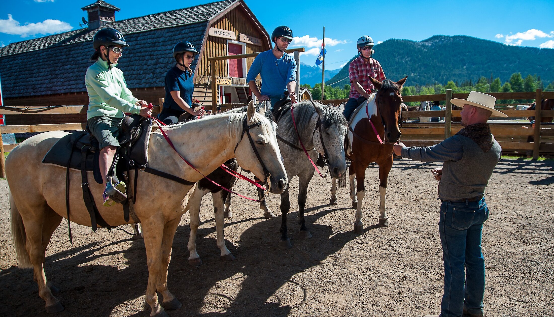 Getting instruction before heading out on a trail ride in Banff