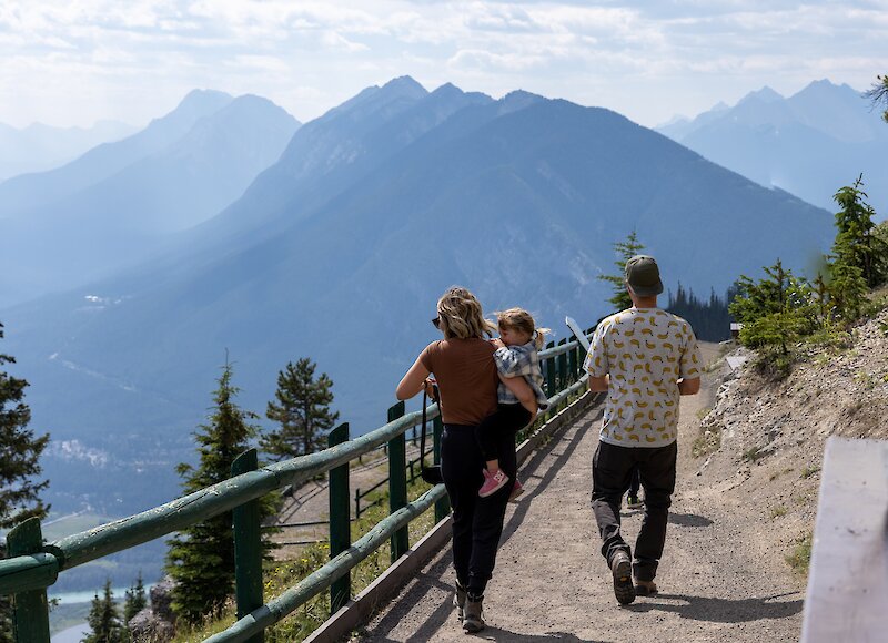 A family walking to the viewpoint on Mt Norquay Chairlift