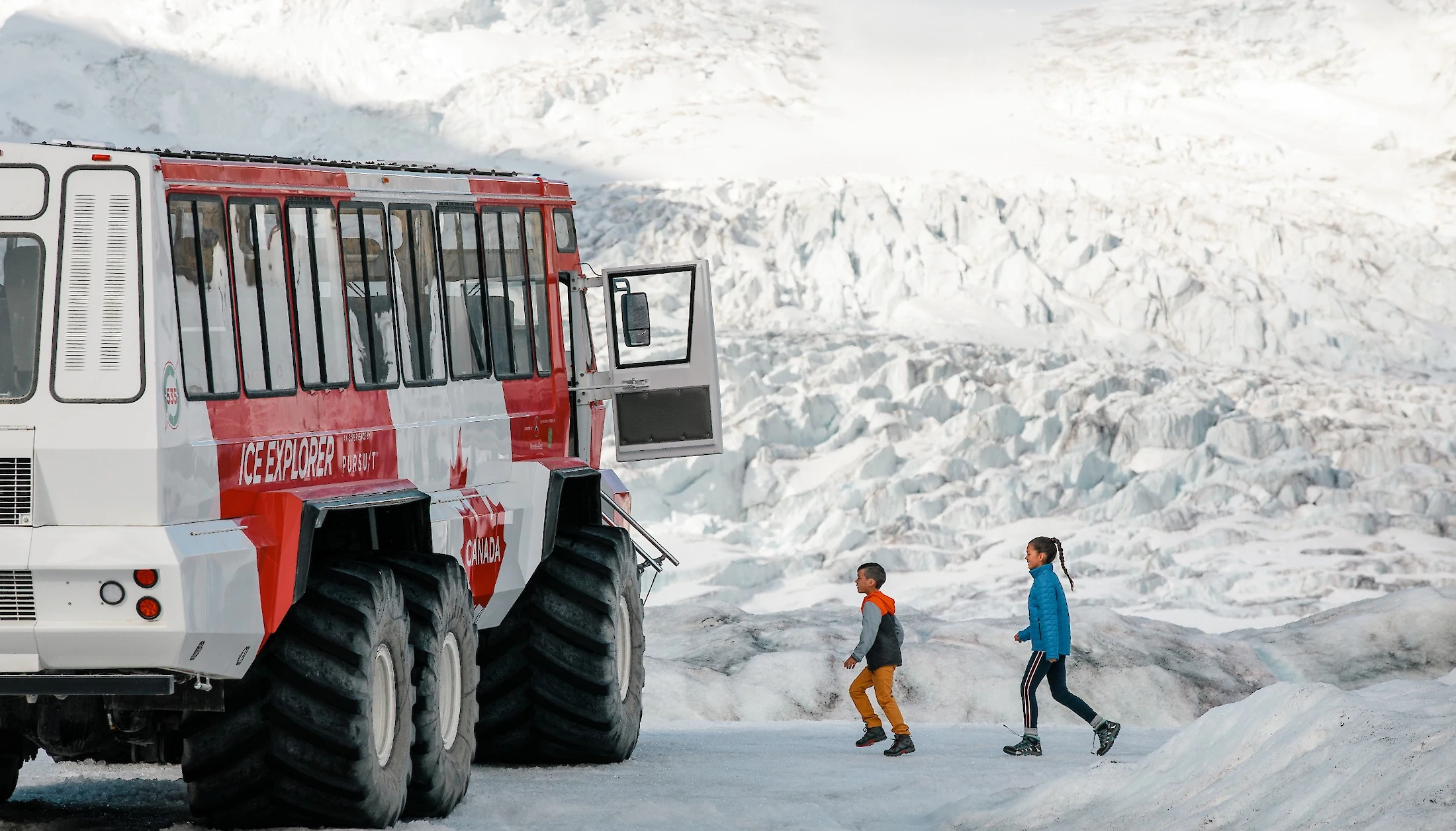 Two Children getting on the Ice Explorer bus on the Columbia Icefield Glacier