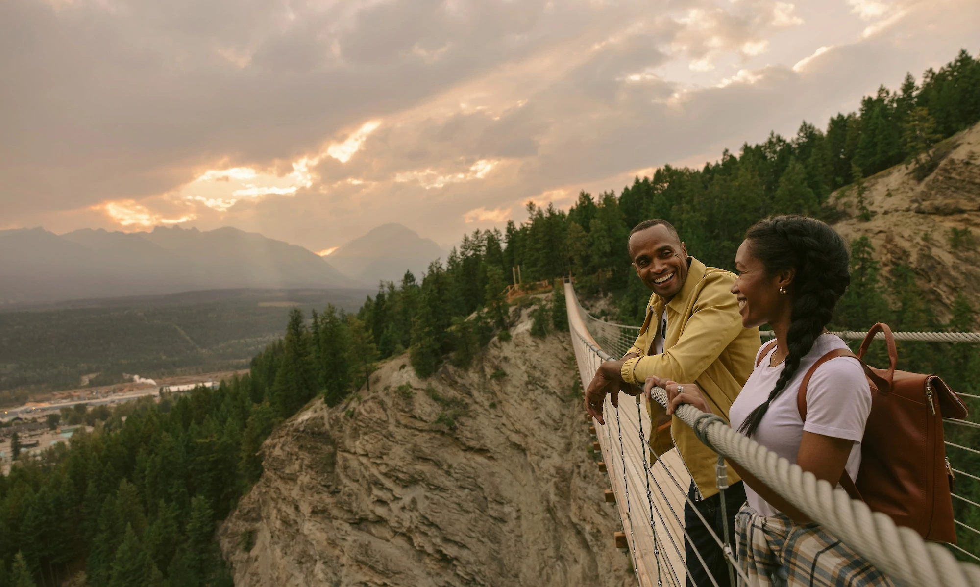 A couple enjoying the view on the Golden Skybridge looking across the Columbia Valley