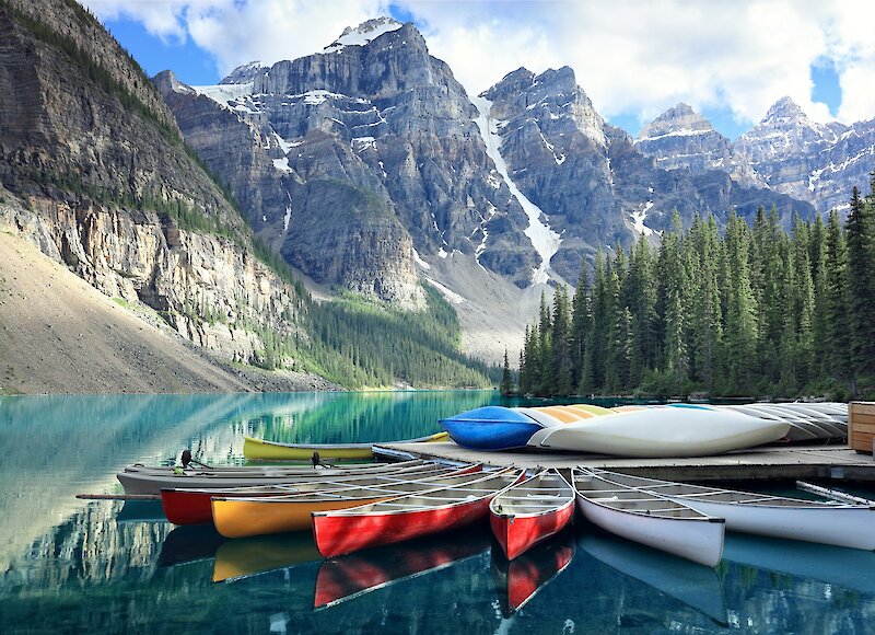 Canoes on the water at Moraine Lake