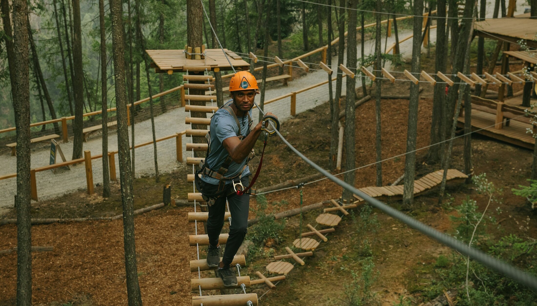 Enjoying the ropes course at the Golden Skybridge