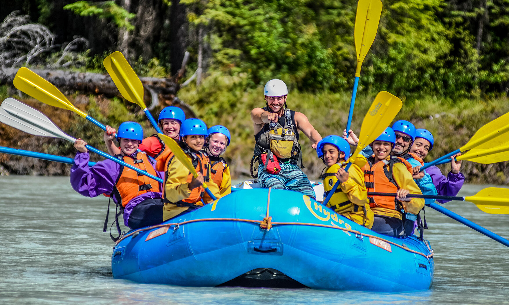 Raft full of families on the Kicking Horse River