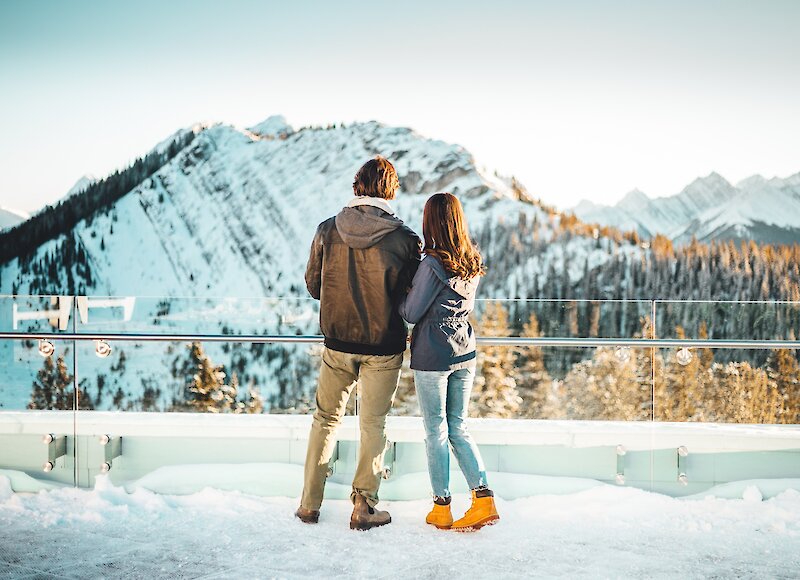A couple enjoying the view from the Banff Gondola on Sulphur Mountain