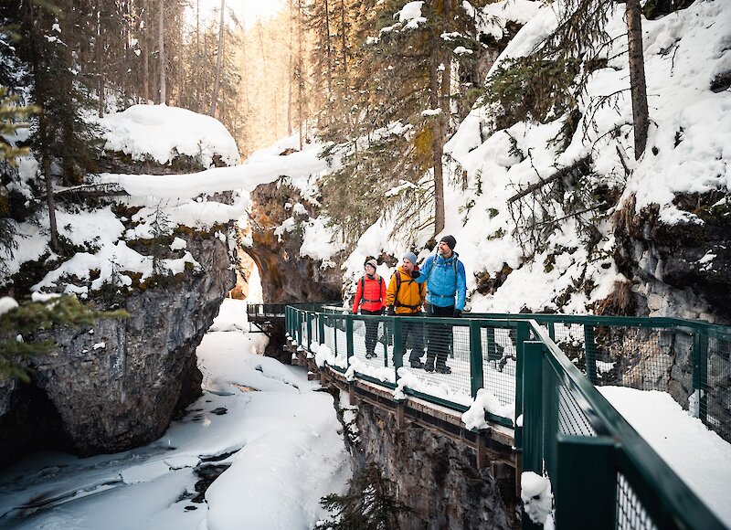 Walking along the catwalks in Johnston Canyon in winter