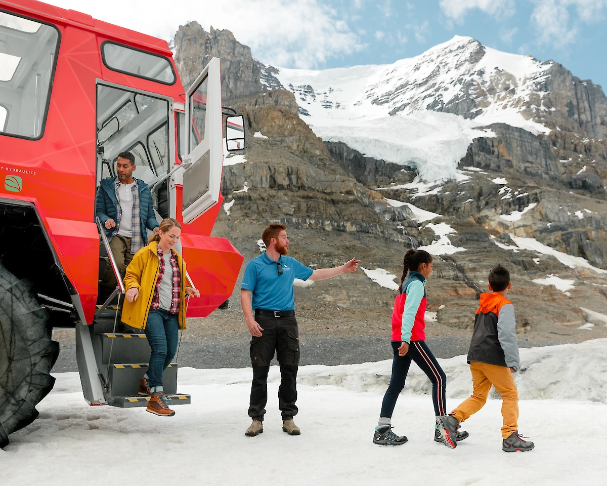 Guests exiting the Ice Explorer on the Colubia Icefield Adventure